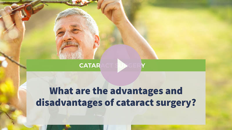 A senior man looking happily while trimming his tree in the garden.
